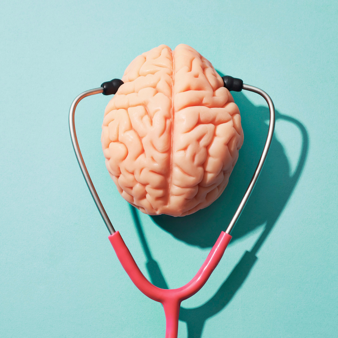imagen colorida de un cerebro con un estetoscopio, haciendo referencia a salud cerebral